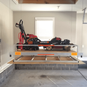 Attic lift with lawn mower