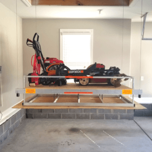 Lawn equipment on attic lift